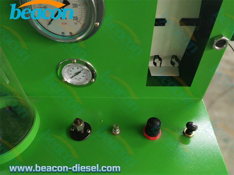 Zona de montaje del inyector con tuberías de alta presión y extracción de niebla