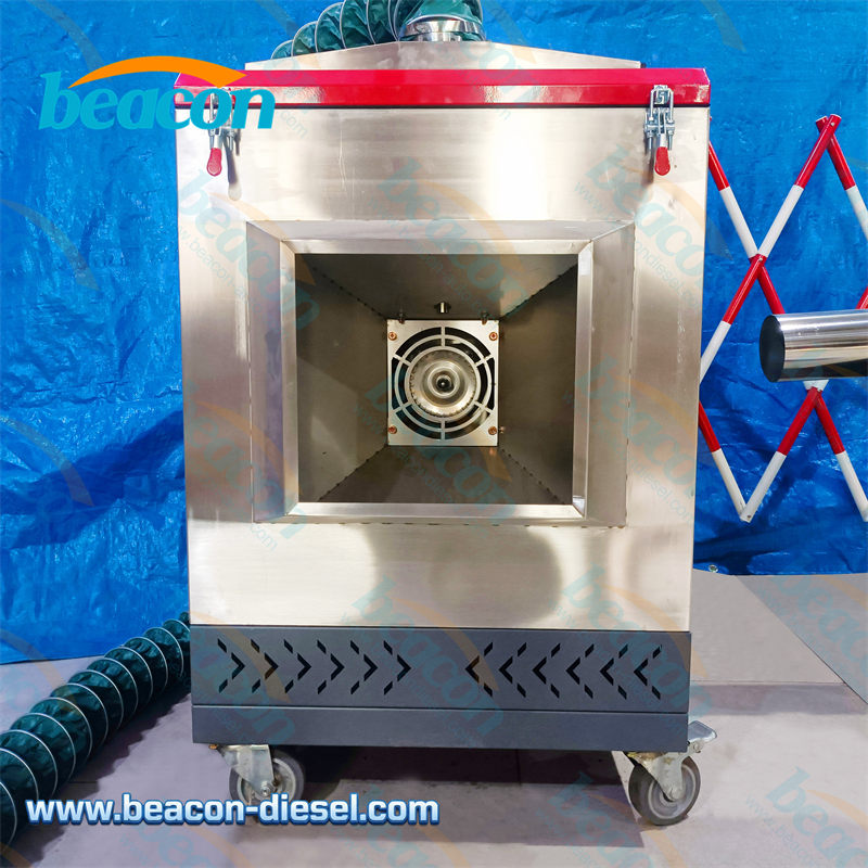 Perfil lateral del equipo de limpieza DPF mostrando la conexión de la mesa móvil.