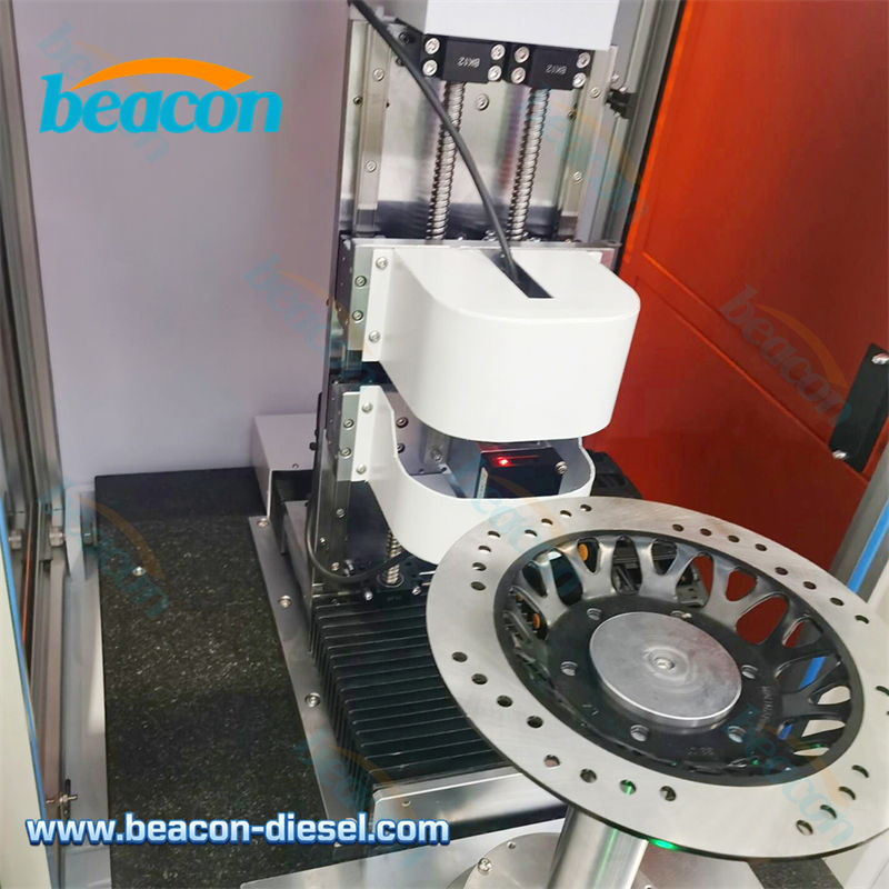 Primer plano del husillo neumático y sensores láser